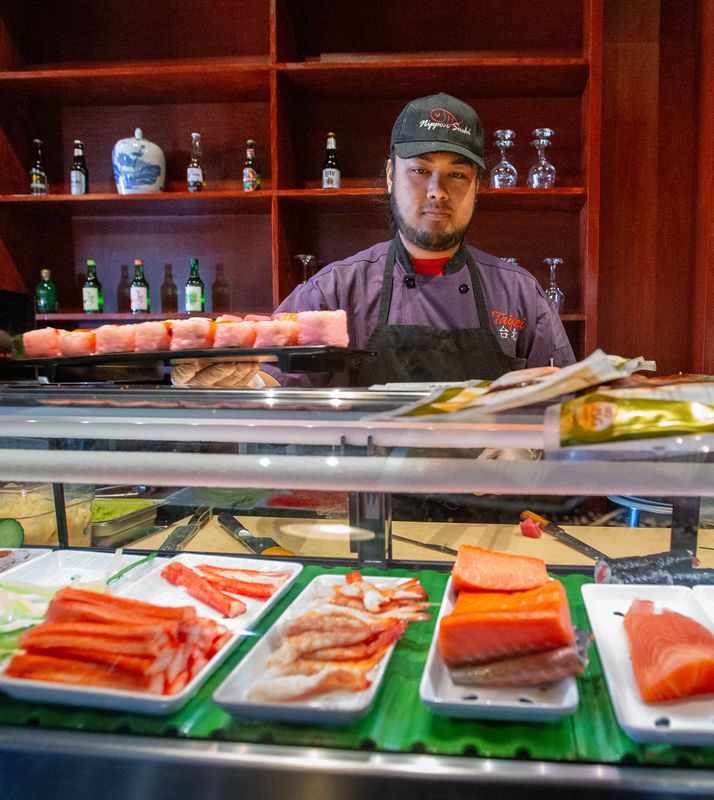 Jordan Smith prepares an order at Fuji Sushi & Grill at 6235 N. Davis HIghway in Pensacola on Wednesday, April 9, 2025.