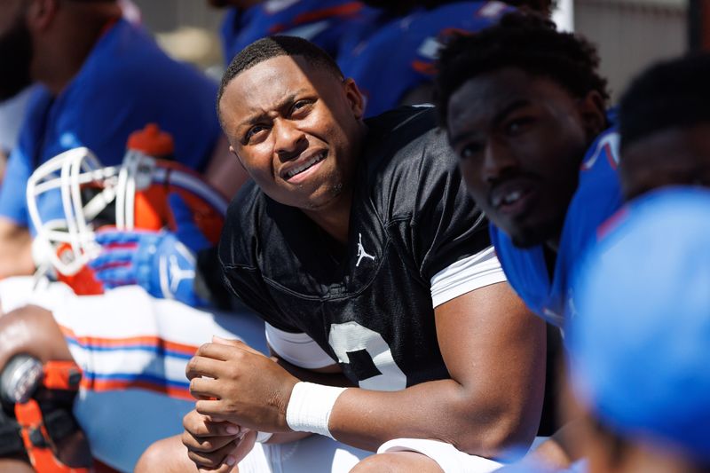 Apr 12, 2025; Gainesville, FL, USA; Florida Gators quarterback DJ Lagway (2) looks at the scoreboard from the bench during the second half at Ben Hill Griffin Stadium. Mandatory Credit: Matt Pendleton-Imagn Images