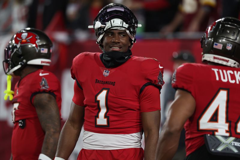 Jan 12, 2025; Tampa, Florida, USA; Tampa Bay Buccaneers running back Rachaad White (1) warms up before a NFC wild card playoff against the Washington Commanders at Raymond James Stadium. Mandatory Credit: Kim Klement Neitzel-Imagn Images