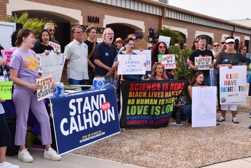Protesters in support of Melissa Calhoun, an AP English teacher at Satellite High School, rallied outside before the April 22 school board meeting in Viera. Calhoun’s contact was not renewed for the 2025-26 school year.