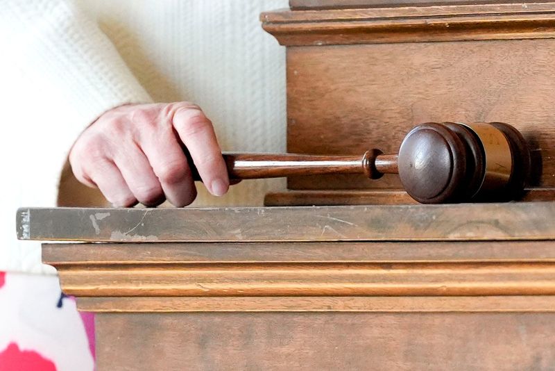 University of Iowa Faculty Senate President Caroline Sheerin holds the gavel April 29, 2025 in the Old Capitol Building in Iowa City, Iowa.
