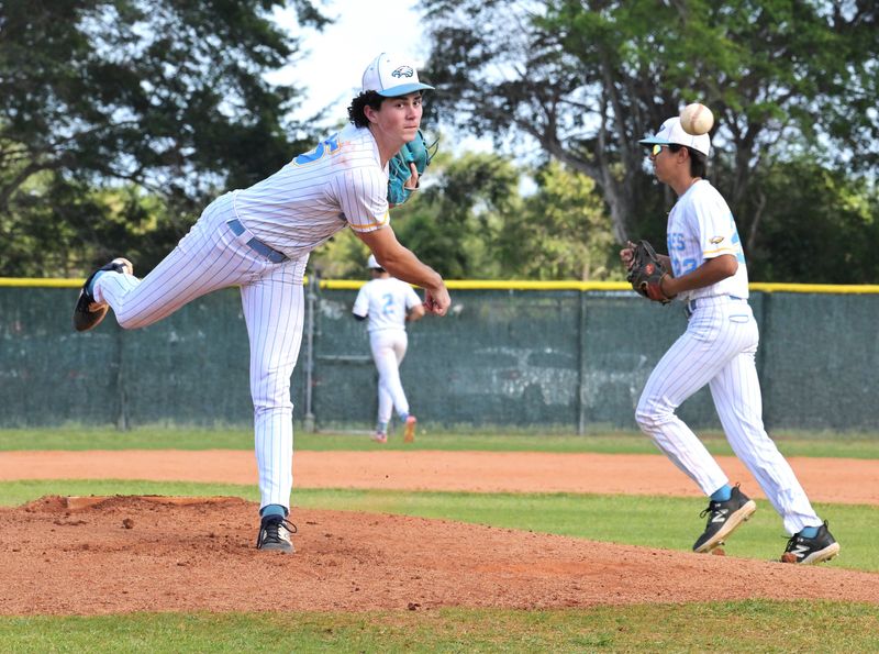 St. John Paul II's Jack Wilhoit warms up before second inning during a regional quarterfinal win against True North on April 24, 2025.