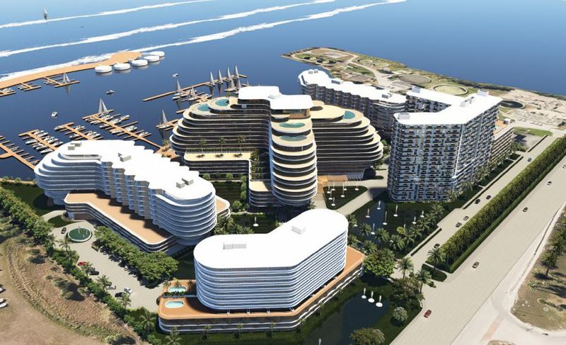 An artist's rendering shows the planned Causeway Cove development at 601 Seaway Drive. It would include over 1,000 apartments, over 200 hotel rooms and over 2,300 parking spots, and would use the Live Local Act to get around local height and density limits.