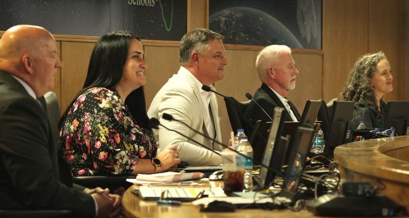 Superintendent Mark Rendell, pictured at a May 6 school board meeting, sits with Megan Wright, Matt Susin, Gene Trent, Katye Campbell and John Thomas (not pictured).
