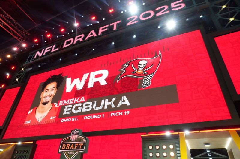 Apr 24, 2025; Green Bay, WI, USA; Ohio State Buckeyes receiver Emeka Egbuka is selected as the No. 19 pick by the Tampa Bay Buccaneers during the NFL Draft at Lambeau Field. Mandatory Credit: Kirby Lee-Imagn Images