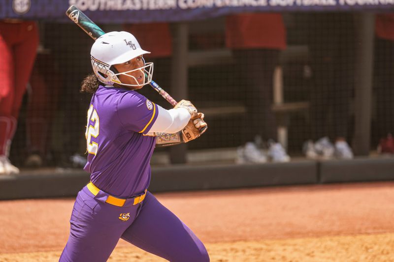 May 8, 2025; Athens, GA, USA; LSU utility Tori Edwards (42) drives in a run with a hit against Oklahoma at Jack Turner Stadium. Mandatory Credit: Dale Zanine-Imagn Images