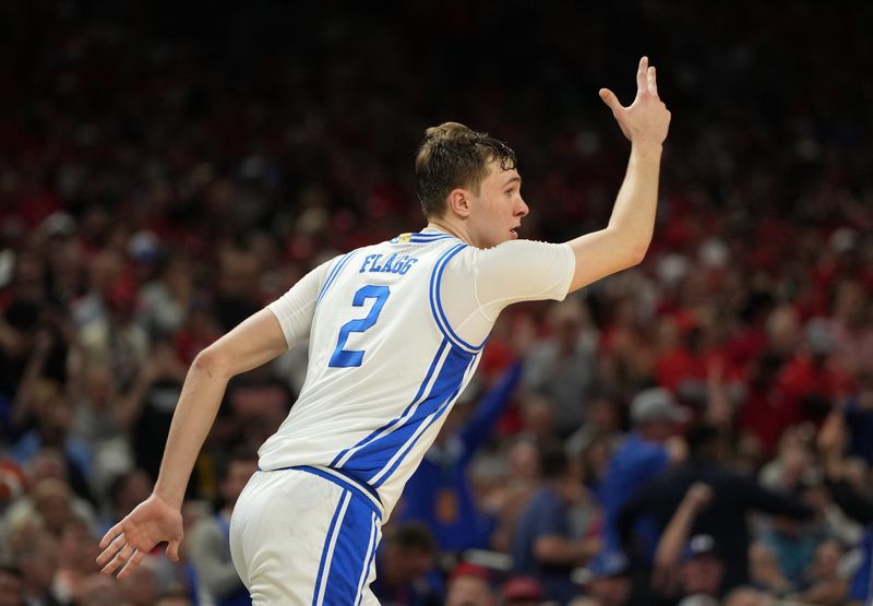 Apr 5, 2025; San Antonio, TX, USA; Duke Blue Devils forward Cooper Flagg (2) reacts after a play against the Houston Cougars during the second half in the semifinals of the men's Final Four of the 2025 NCAA Tournament at the Alamodome. Mandatory Credit: Bob Donnan-Imagn Images ORG XMIT: IMAGN-1026925 ORIG FILE ID: 20250405_jcd_sd2_0333.JPG