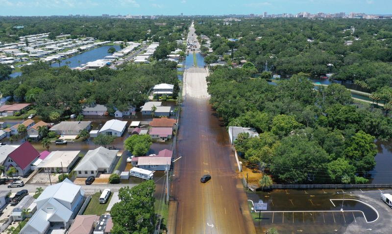 Areas of Pinecraft in Sarasota, on Bahia Vista Street, were flooded as Phillippi Creek continued to crest on Tuesday, Aug. 6, 2024, from then-Tropical Storm Debby.