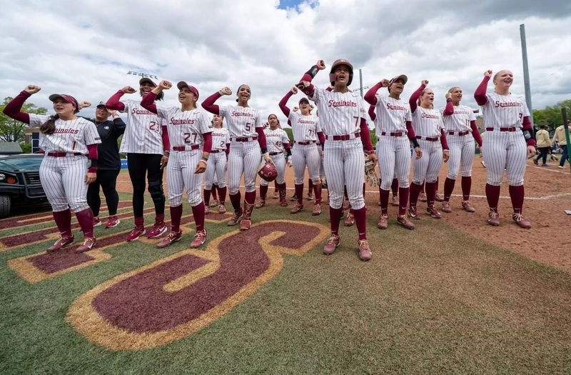 Florida State softball are together to do their war chant after a game.