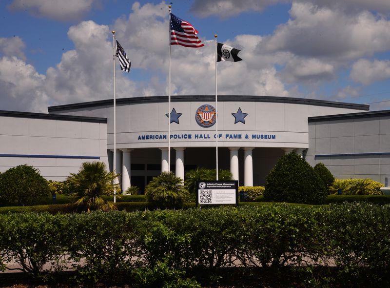 In honor of National Police Week, observed May 11-17, 11,992 American flags surround the American Police Hall of Fame and Museum in Titusville, the nation's first national police museum and memorial dedicated to American law enforcement officers killed in the line of duty. Each flag represents an officer whose name is on the memorial wall inside. An evening memorial service at the museum is set for May 16.