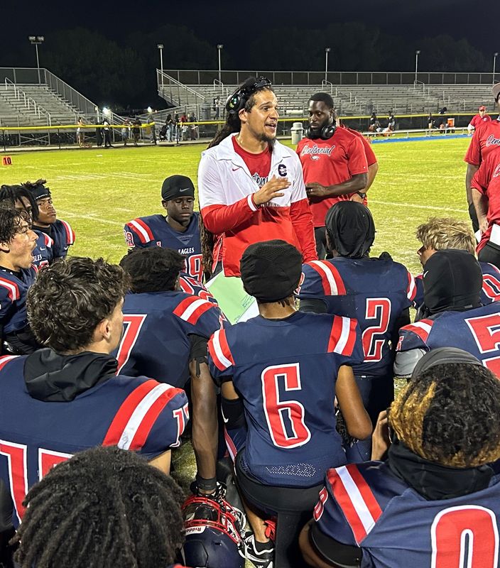 St. Lucie West Centennial head football coach Jacob Turay talks to his team after the Eagles hosted Santaluces and Heritage in a spring jamboree on Friday, May 16, 2025 from South County Regional Sports Stadium in Port St. Lucie.