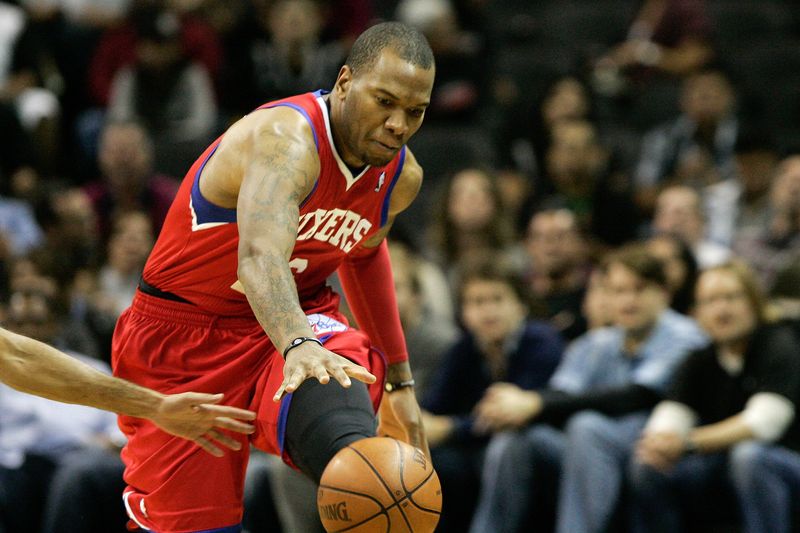Nov 13, 2010; San Antonio, TX, USA; Philadelphia 76ers forward Marreese Speights (16) dives for a loose ball against San Antonio Spurs during the first half at the AT&T Center. Mandatory Credit: Soobum Im-USA TODAY Sports