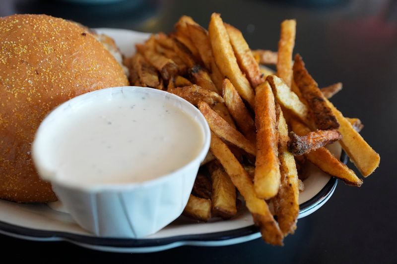 The local favorite feta dipping sauce and french fries at The Grill in downtown Athens, Ga., on Wednesday, May 21, 2025.
