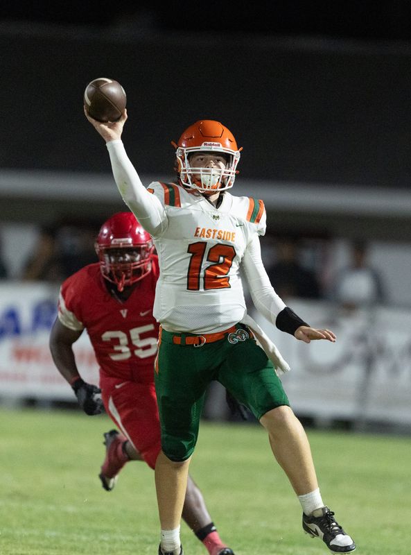 Eastside Andrew “Cade” Sutherland (12) passes against Vanguard during Spring football at Booster Stadium in Ocala, FL on Thursday, May 22, 2025. [Alan Youngblood/Ocala Star-Banner]