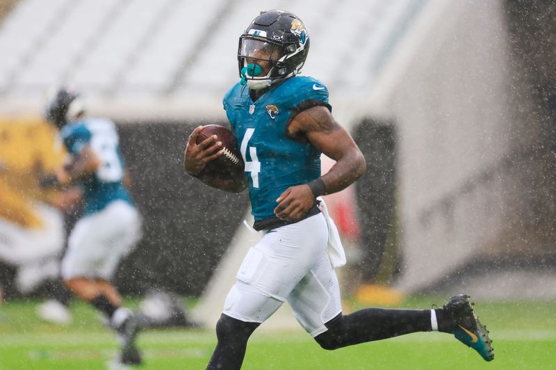 Jacksonville Jaguars running back Tank Bigsby (4) warms up before an NFL football matchup Sunday, Dec. 29, 2024 at EverBank Stadium in Jacksonville, Fla. The Jaguars held off the Titans 20-13. [Corey Perrine/Florida Times-Union]