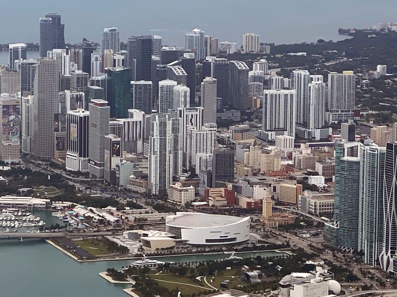 Miami, Florida; USA; General overall aerial view of the American Airlines Arena and the downtown Miami skyline.