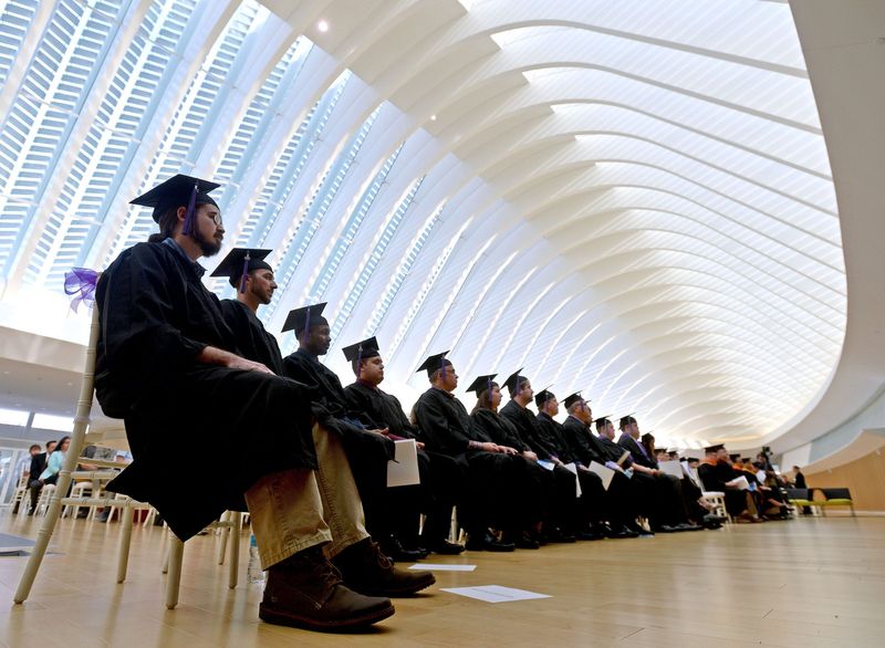 Students listen to the commencement address by former State Senator J.D. Alexander during the Inaugural Commencement for Florida Polytechnic University in the Innovation, Science & Technology Building on campus in Lakeland, Fl on Tuesday January 3, 2017.