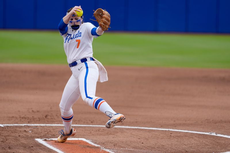 Florida's Keagan Rothrock (7) pitches during a Women's College World Series softball game between the Texas Longhorns and the Florida Gators at Devon Park in Oklahoma City, Thursday, May 29, 2025.