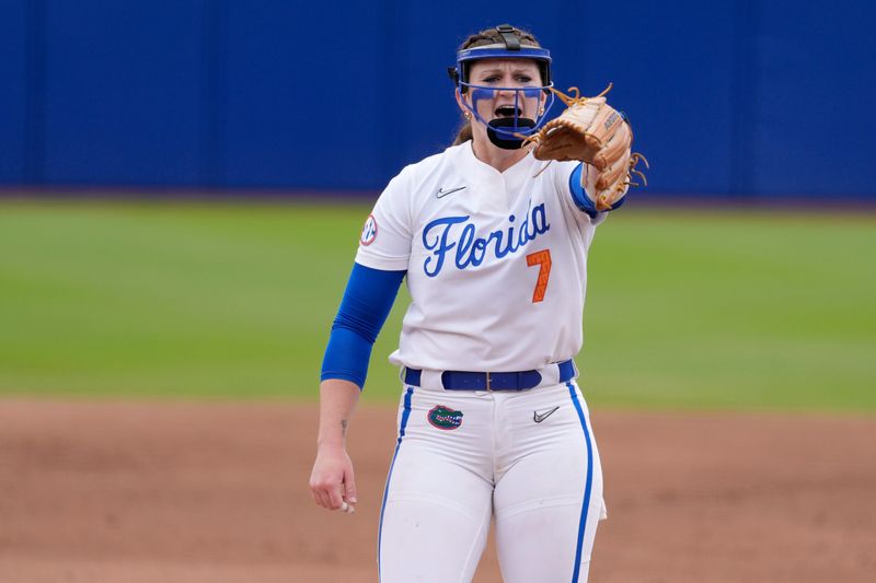 Florida pitcher Keagan Rothrock (7) celebrates after an out during a Women's College World Series softball game between the Texas Longhorns and the Florida Gators at Devon Park in Oklahoma City, Thursday, May 29, 2025.