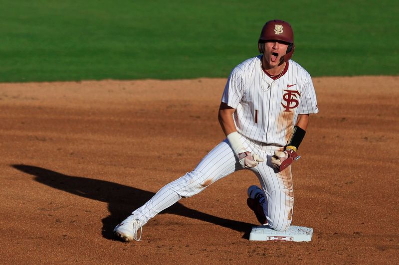 Florida St. infielder Alex Lodise (1) reacts to his double at second base during the first inning of an NCAA college baseball matchup Tuesday, March 25, 2025 at VyStar Ballpark in Jacksonville, Fla. FSU rallied to defeat UF 8-4 off a walk-off grand slam from Alex Lodise in the ninth inning. [Corey Perrine/Florida Times-Union]