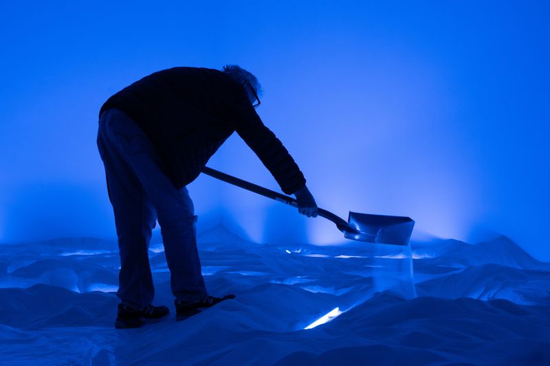 California-based artist Laddie John Dill uses a shovel to form the valleys, ridges and dunes that define his inaugural Norton Museum installation, "Eastern Standard Time."