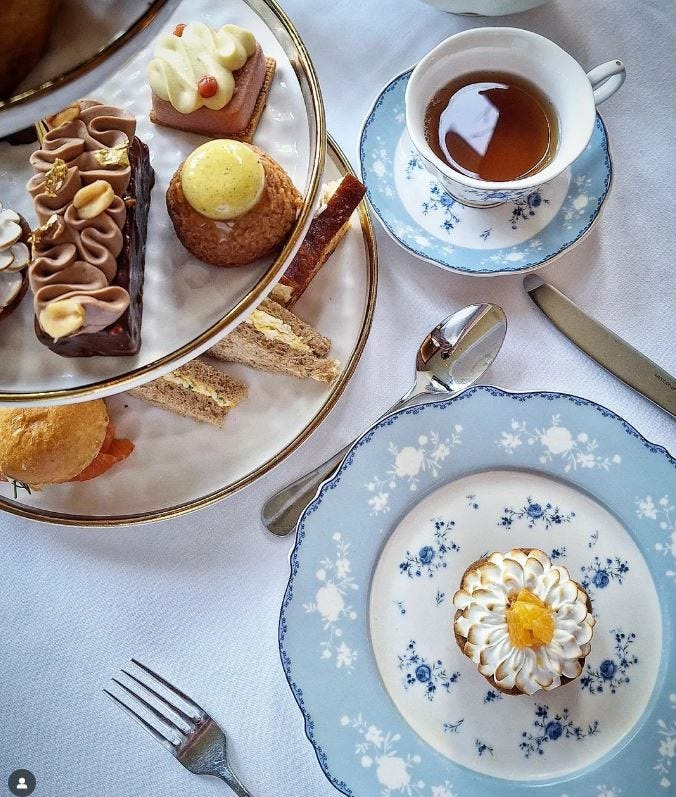 Afternoon tea at Café Boulud features scones with Devonshire cream and preserves, and dainty tea sandwiches such as cucumber, smoked salmon and ham with gruyere.