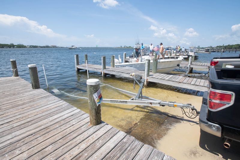 Boats launch at the Galvez Landing Boat Ramp in the Innerarity area of Escambia County on May 30, 2025.