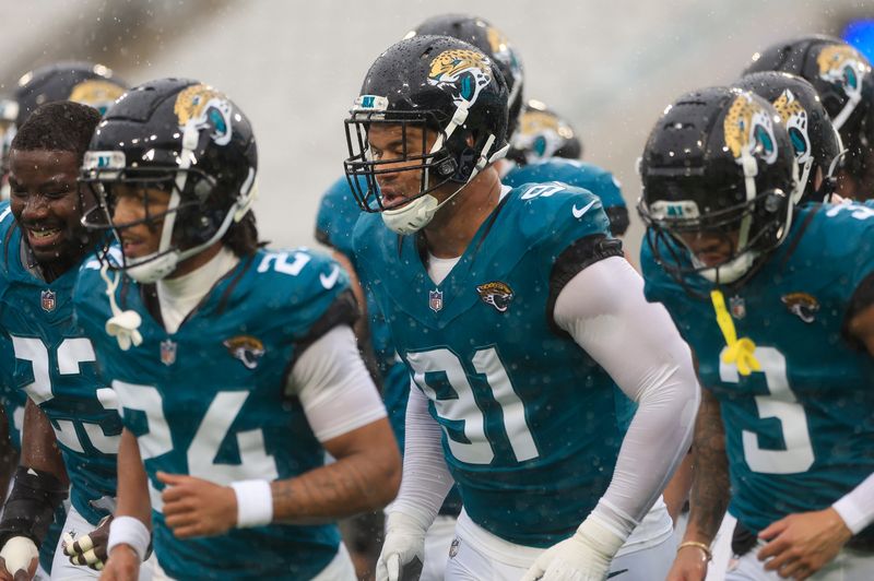 Jacksonville Jaguars defensive end Arik Armstead (91) runs off the field before an NFL football matchup Sunday, Dec. 29, 2024 at EverBank Stadium in Jacksonville, Fla. The Jaguars held off the Titans 20-13. [Corey Perrine/Florida Times-Union]