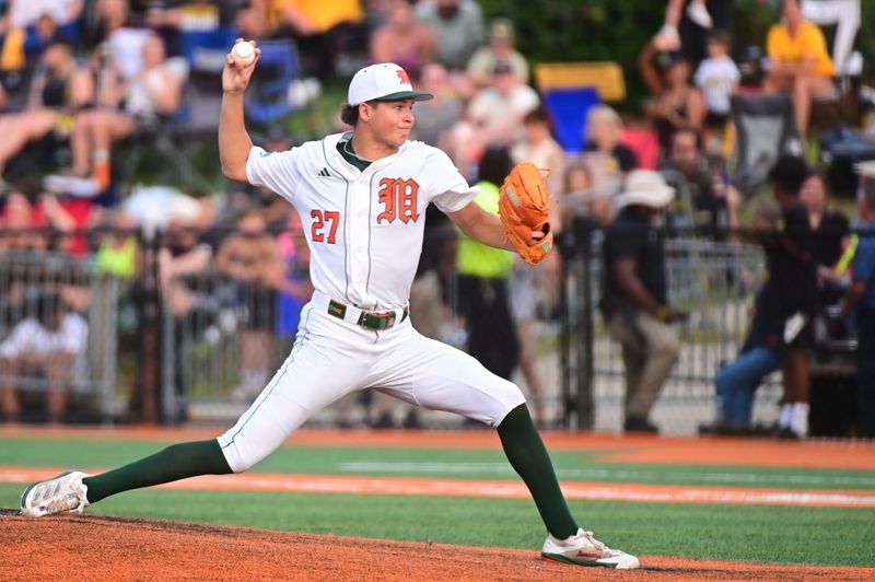 June 1, 2025; Hattiesburg , Mississippi, USA. Miami Hurricanes starting pitcher Tate DeRias (27) pitches against the Southern Miss Golden Eagles during a 2025 NCAA Hattiesburg Regional game at Pete Taylor Park in Hattiesburg, Mississippi, on June 1, 2025. Mandatory Credit: Matt Bush