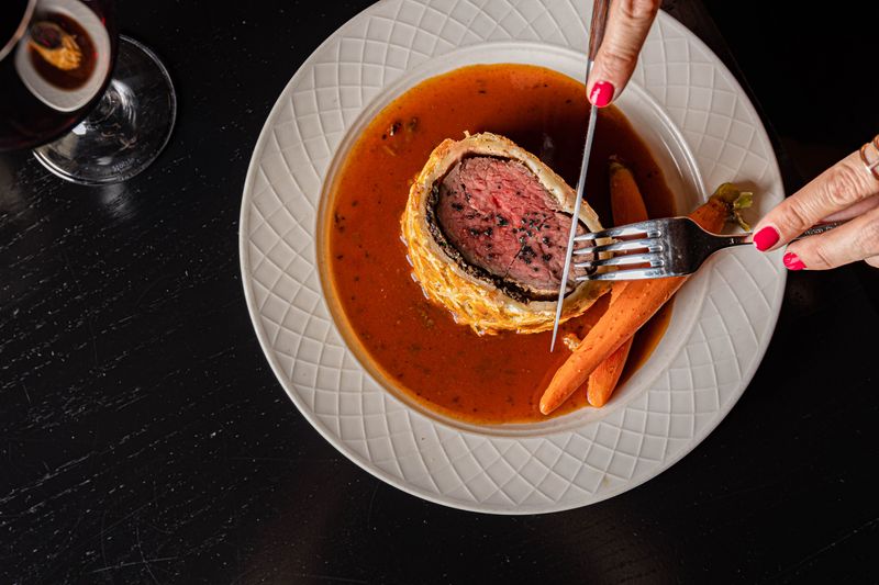 Beef Wellington is Harry's signature dish.