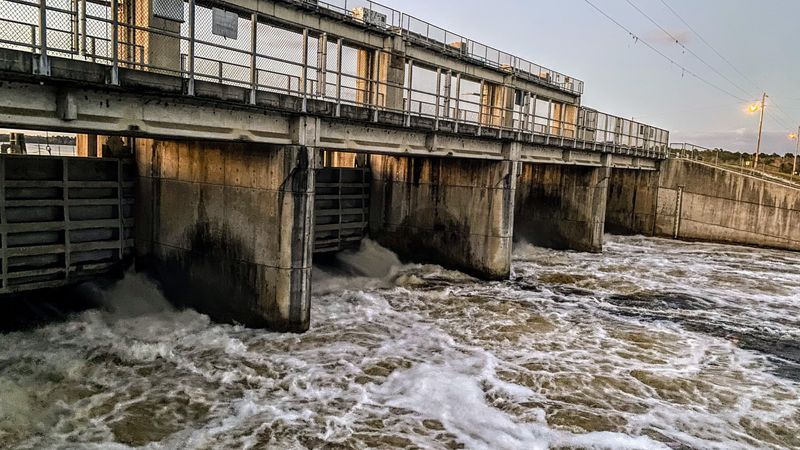 The Kirkpatrick Dam is named for Florida Sen. George Kirkpatrick (1938-2003), who served from 1980 to 2000. He was a fierce advocate for the dam and reservoir. The Florida Legislature renamed the dam in his honor in 1998. Sen. Kirkpatrick was a key figure in preserving the dam and reservoir, particularly for the bass fishing community. Also known as Rodman Dam, the structure was built in 1968 as part of the Cross-Florida Barge Canal project, built by the U.S. Army Corps of Engineers. It created the Rodman Reservoir by blocking the Ocklawaha River. Engineers say it's in potentially dangerous disrepair, and scientists say it's not worth the upkeep and that it does more harm than good to the ecoysystem.