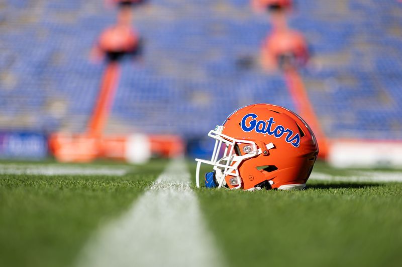 Nov 23, 2024; Gainesville, Florida, USA; A Florida Gators helmet sits on the field before a game against the Mississippi Rebels at Ben Hill Griffin Stadium. Mandatory Credit: Matt Pendleton-Imagn Images