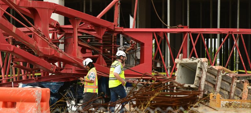 Investigators and other officials were on the scene June 5, a day after two construction workers were killed when they were hit by a collapsing crane at the site of the future Health First Cape Canaveral Hospital, off State Road 520 on Merritt Island.
