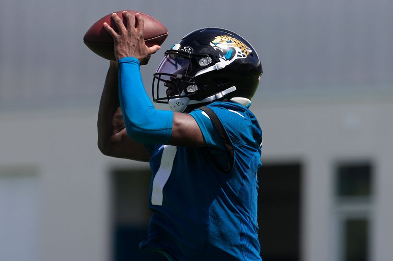Jacksonville Jaguars wide receiver Brian Thomas Jr. (7) catches a pass from quarterback Trevor Lawrence (16), not shown, during the 10th organized team activity at Miller Electric Center Wednesday, June 4, 2025 in Jacksonville, Fla. [Corey Perrine/Florida Times-Union]
