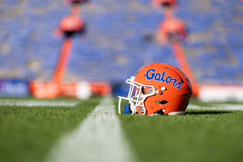 Nov 23, 2024; Gainesville, Florida, USA; A Florida Gators helmet sits on the field before a game against the Mississippi Rebels at Ben Hill Griffin Stadium. Mandatory Credit: Matt Pendleton-Imagn Images