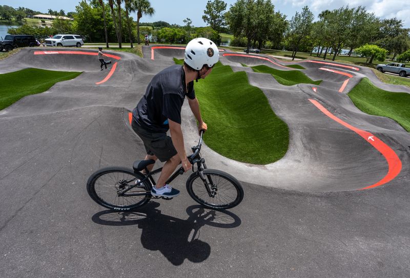 Palm Beach County's first bicycle pump track at Okeeheelee Park is circuit of rollers and banked turns designed for bicycles, foot scooters. It is seen here on Saturday June 7, 2025.