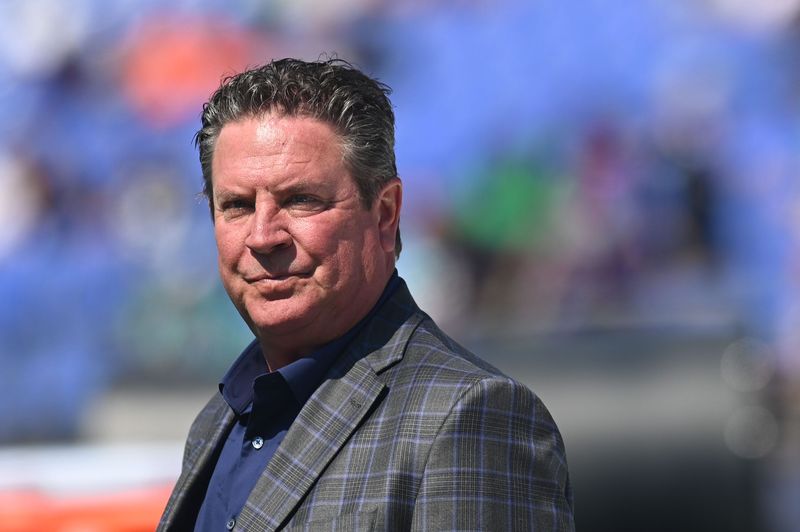 Sep 18, 2022; Baltimore, Maryland, USA; Dan Marino, Pro Football Hall of Fame class of 2005, stands on the field before the game between the Baltimore Ravens and the Miami Dolphins at M&T Bank Stadium. Mandatory Credit: Tommy Gilligan-USA TODAY Sports
