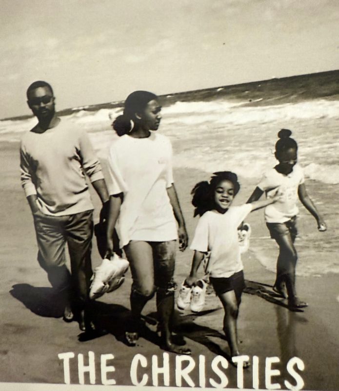 Christie walks along a beach in Palm Beach County with his daughters (from l-r), Rachel, Elisabeth and Taylor, in early 2002.