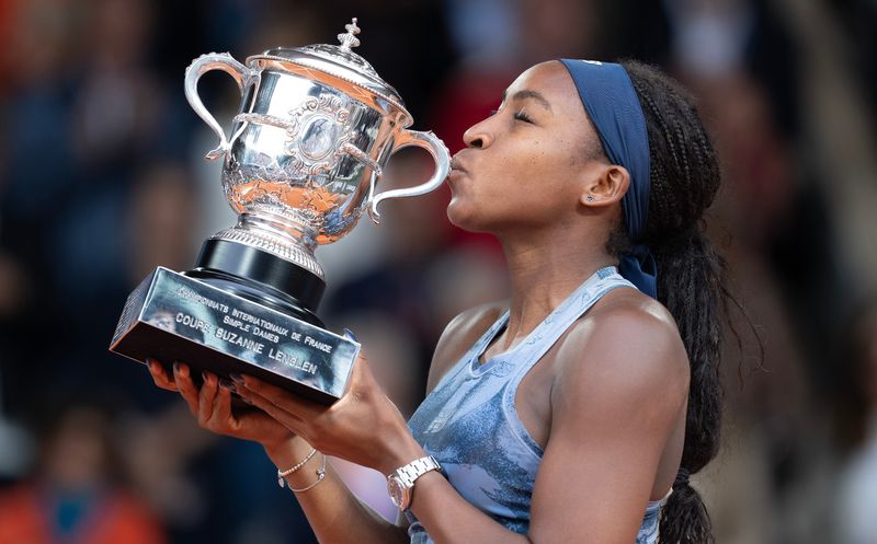 Coco Gauff of the United States kisses the trophy after winning the women’s singles final against Aryna Sabalenka on day 14 at Roland Garros Stadium.