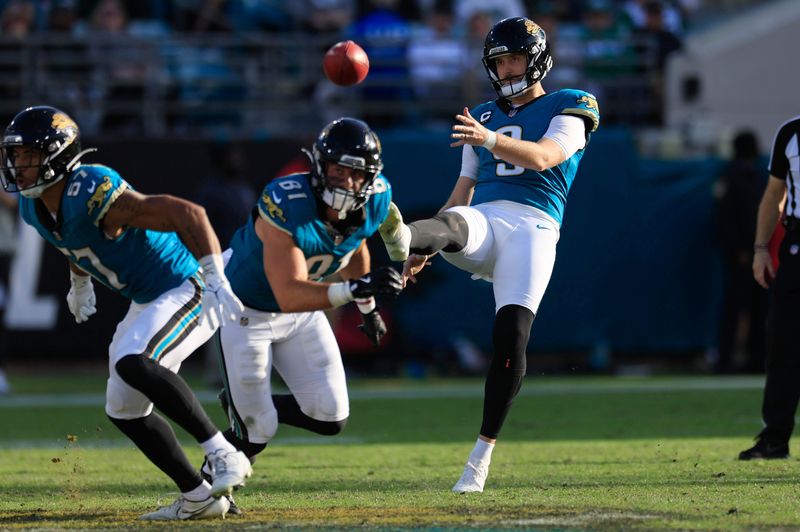 Jacksonville Jaguars punter Logan Cooke (9) punts the ball during the fourth quarter Sunday, Dec. 15, 2024 at EverBank Stadium in Jacksonville, Fla. The Jets held off the Jaguars 32-25. [Corey Perrine/Florida Times-Union]