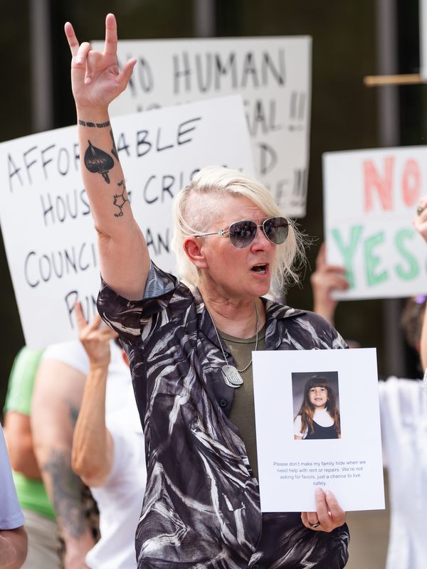 Protestor and Army Veteran Dawn Choate was one of the protesters during the Jacksonville Immigrant Rights Alliance in conjunction with the Jacksonville Palestine Solidarity Network’s "Stop the Trump Stunts" rally in front of Jacksonville City Hall Tuesday June 10, 2025. [Doug Engle/Florida Times-Union]