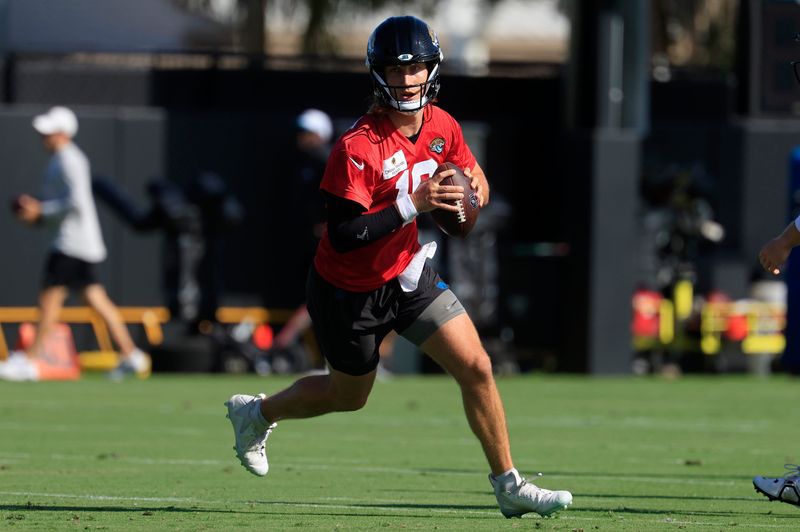 Jaguars quarterback Trevor Lawrence (16) looks to pass during the second day of mandatory minicamp at Miller Electric Center on June 11.