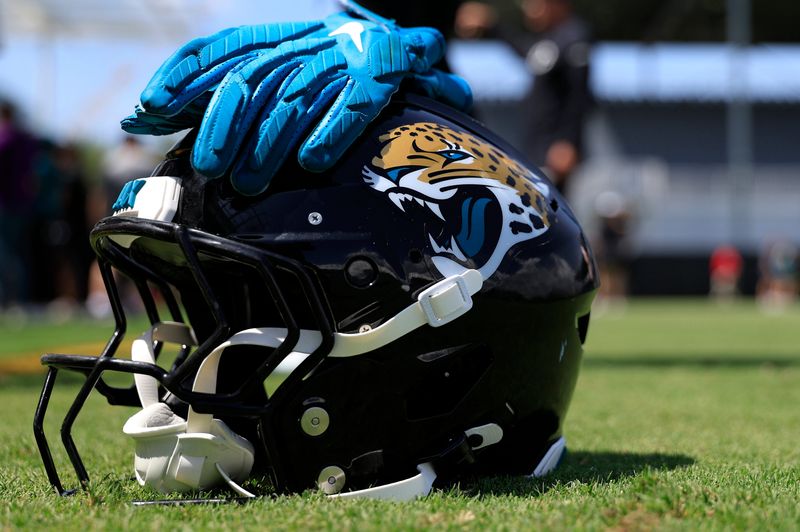 The helmet and gloves of Jacksonville Jaguars running back LeQuint Allen Jr. (36) sit on the field during the second mandatory minicamp at Miller Electric Center Wednesday, June 11, 2025 in Jacksonville, Fla.