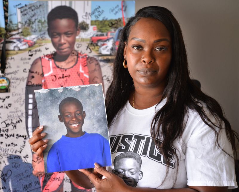 Chrisel Brown talks about her son Jeremiah Khyree Brown,14, who was shot and killed in The Compound on Christmas day in 2022. She is holding one of her favorite photos of her son.