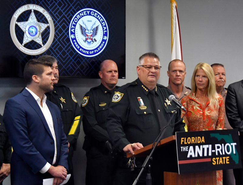 A press conference with Florida Attorney General James Uthmeier, at left, Brevard Sheriff Wayne Ivey, at podium, and others was held June 12 at the BCSO Deputy Barbara Pill Law Enforcement Facility in Titusville. The event went over measures that the state of Florida will take to protect citizens and law enforcement, and punish violent offenses should any take place at protests, while endorsing the right of peaceful protest.