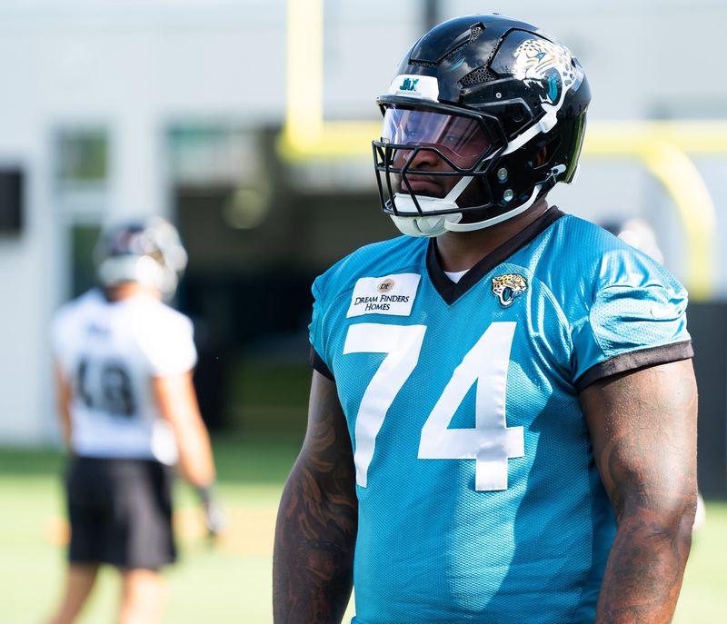 Jacksonville Jaguars offensive tackle Fred Johnson (74) warms up during the Jacksonville Jaguars’ third mandatory minicamp Thursday June 12, 2025 at the Miller Electric Center in Jacksonville, Fla. [Doug Engle/Florida Times-Union]