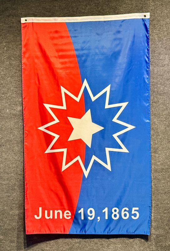 The Juneteenth flag, symbolizing the end of slavery in the United States, is displayed prominently in SC4’s exhibit. The date June 19, 1865, marks the day enslaved people in Texas learned they were free.