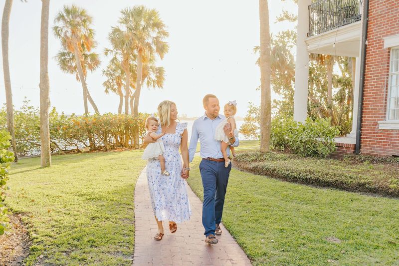 Danielle Marple and her husband, Dr. Andrew Marple, walk with their twin daughters, Adriana and Sophia. Both girls were born prematurely, at just 25 weeks of gestation.