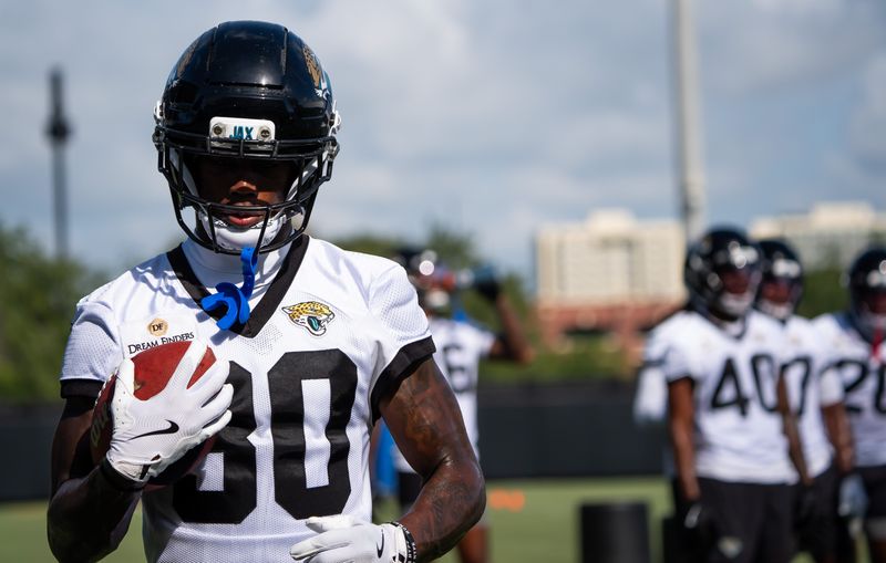 Jacksonville Jaguars cornerback Montaric Brown (30) runs with the ball while running drills during the Jacksonville Jaguarsâ€™ third mandatory minicamp Thursday June 12, 2025 at the Miller Electric Center in Jacksonville, Fla. [Doug Engle/Florida Times-Union]