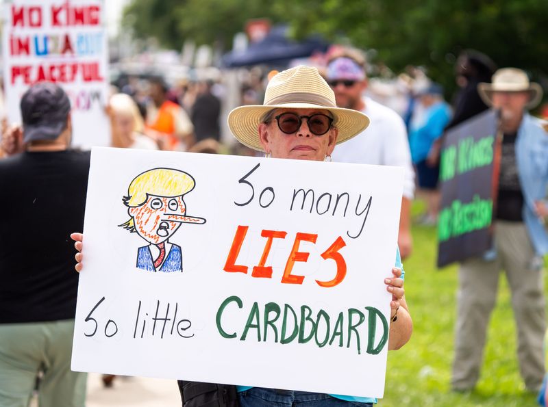 A few thousand people lined Beach Boulevard near the intersection of Hodges Bouldcards during the "No Kings" protests in Jacksonville Beach, Fla. Saturday June 14, 2025. [Doug Engle/Florida Times-Union]